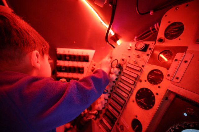 Inside the Submarine: Red-Lit Control Panel Experience