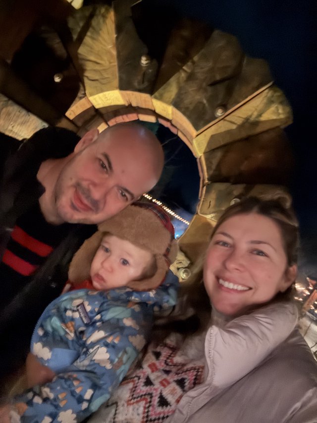 Family Christmas Portrait Looking Up at Tree