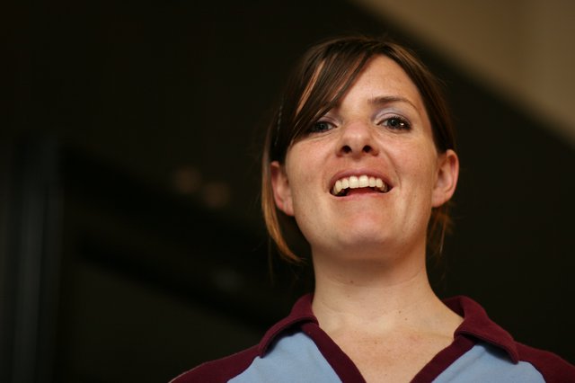 Joyful Woman Smiling Upward in Candid Portrait