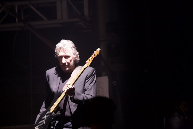 Roger Waters Rocks the Stage with his Electric Guitar