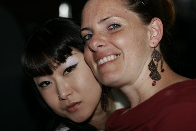 Two Friends Share a Close Moment at Night