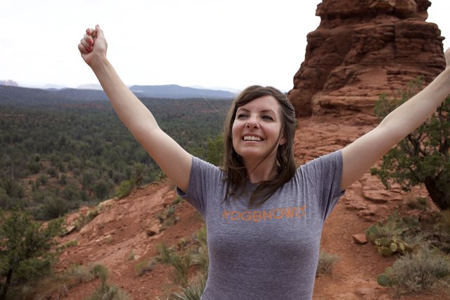 Triumphant Hiker Celebrates Atop Sedona Red Rocks