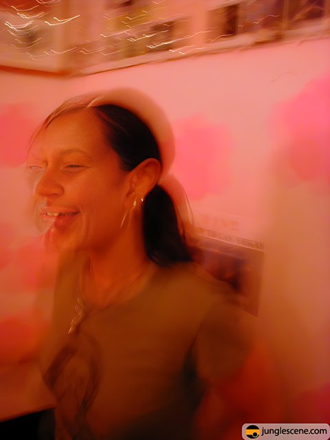 Blurry Pink Room Partygoer