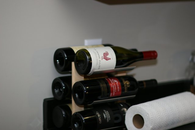 A Bottle of Wine Ready to be Uncorked