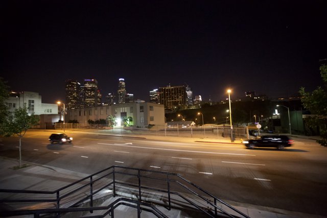 Nighttime Drive through a Bustling Metropolis