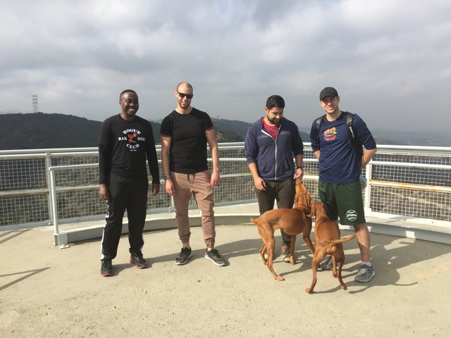 Four Men and a Dog Overlooking the Santa Monica Mountains