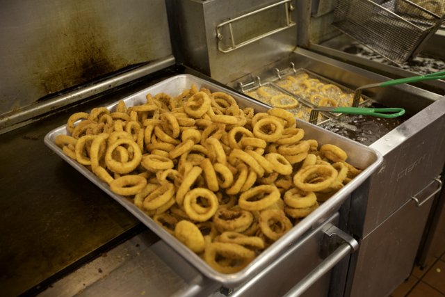 Crispy Onion Rings at a Busy Cafeteria