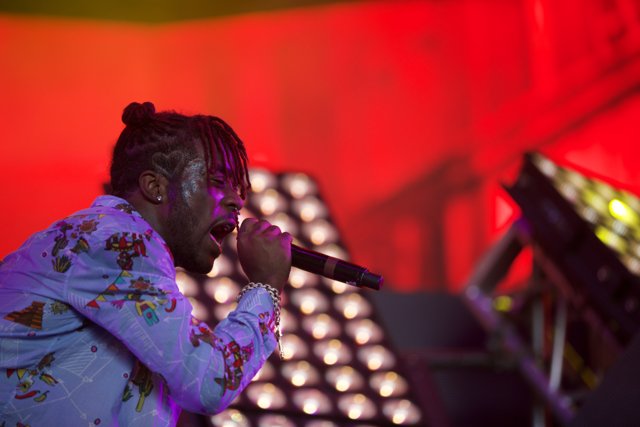 Lil Uzi Vert Rocks the Stage with a Mohawk and a Microphone