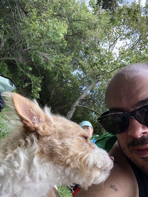 Man and Dog in Sunglasses