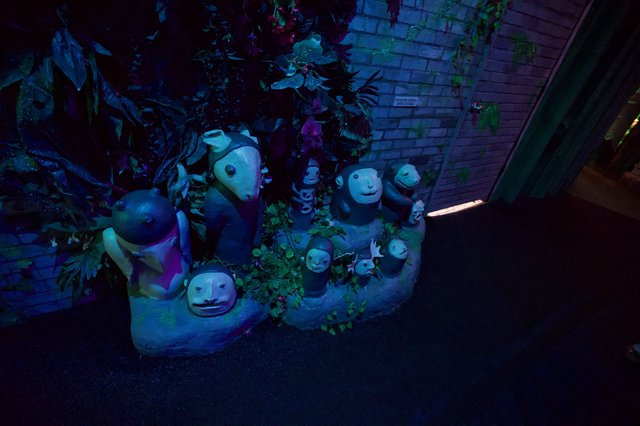 Whimsical Garden Characters in Blue Twilight
