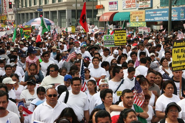 White Clad Crowd Marching in Parade