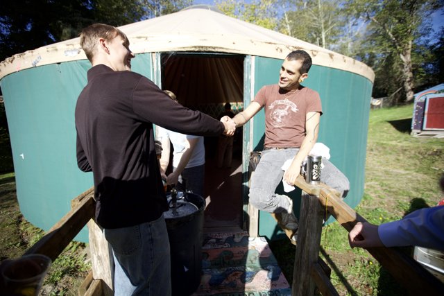 Handshake in Front of a Yurt