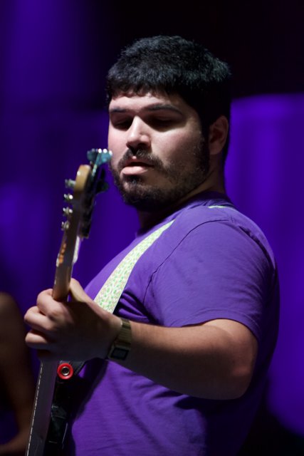 Purple Shirt Guitarist