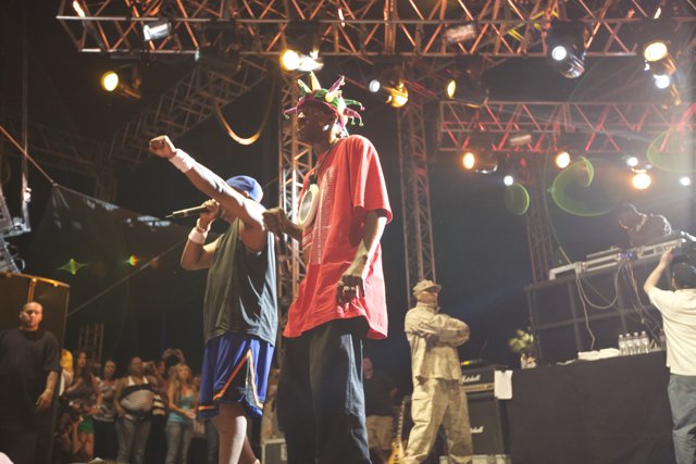 Two Men Take the Stage with Microphones at Coachella 2009
