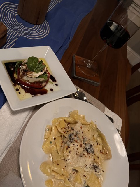 A Delicious Plate of Pasta and Wine