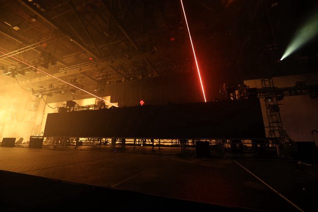 Red Laser Slices Through Smoky EDM Festival Stage
