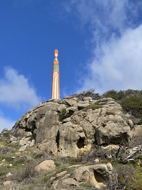 Towering Beacon Overlooking Nature's Beauty