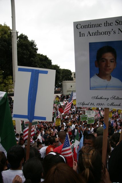 Boy's Message Echoes Through the Crowd