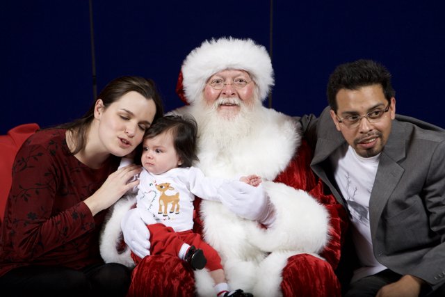 A Festive Family Portrait with Santa