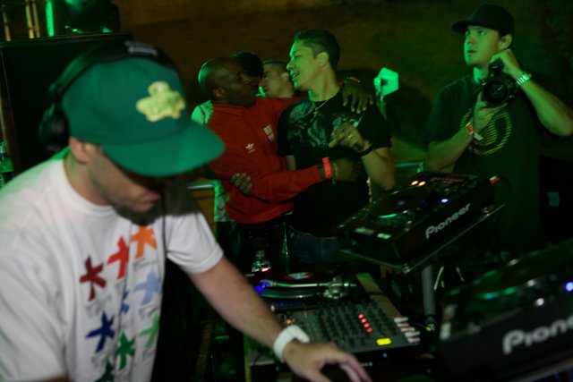 DJ in a Green Cap