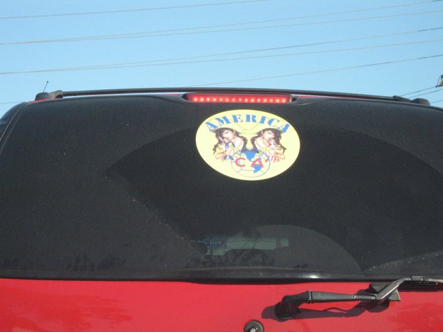 Red Car with Distinctive Sticker