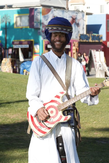 Guitarist in a Turban Serenades the Outdoors