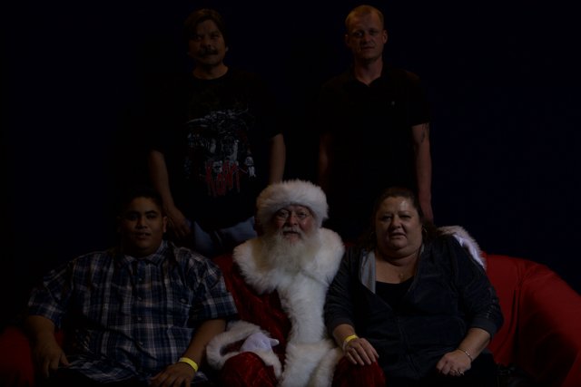 Festive Group Photo with Santa Claus