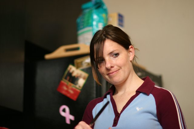 Candid Kitchen Moment with a Subtle Smile