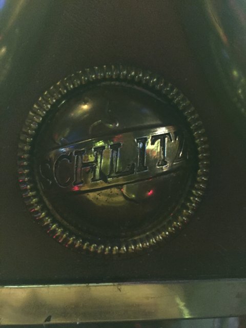 Metallic Logo Badge on Automotive Wheel