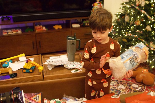 Christmas Morning Gift Unwrapping at Home