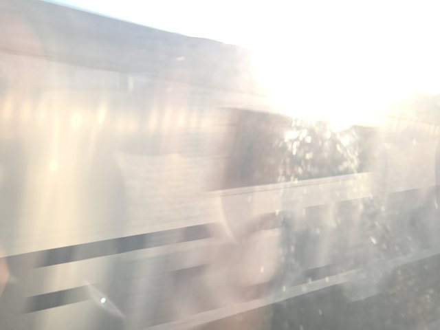Sunshine Flare on Train Window