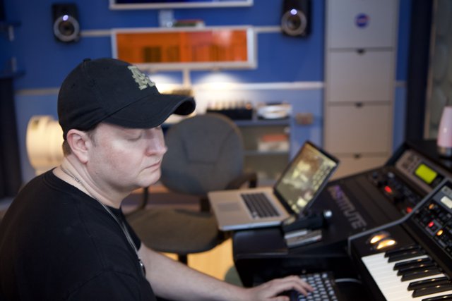 Keyboard Performance in a Black Cap
