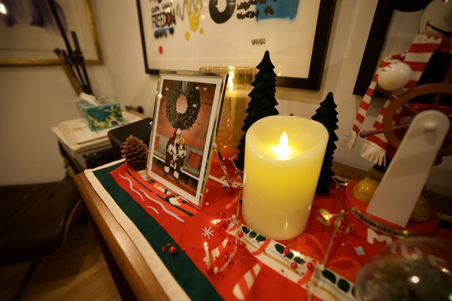 Cozy Christmas Display with LED Candle and Family Photo