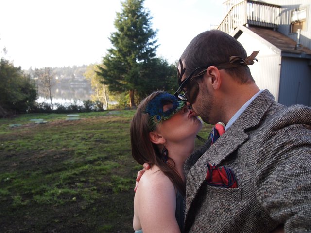 Masked Kiss at Lakeside Masquerade Party