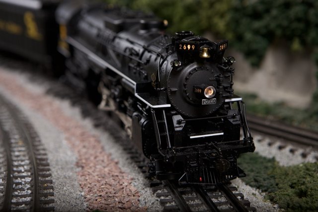 Black Locomotive on Railroad Track