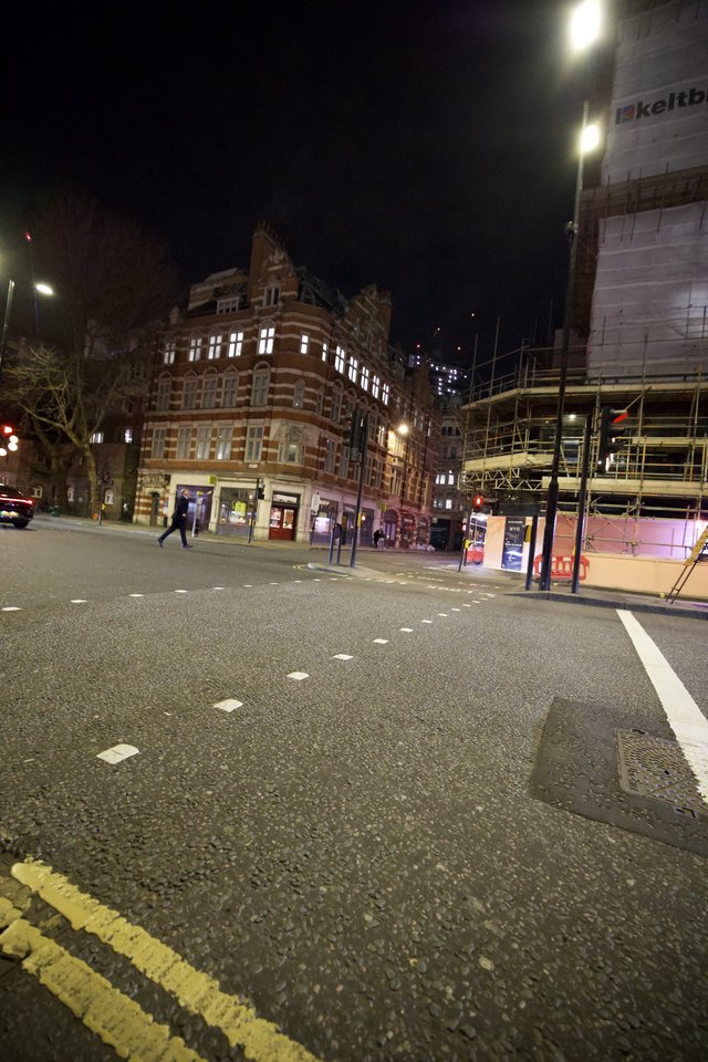 Victorian Corner Building Illuminated at Night in London