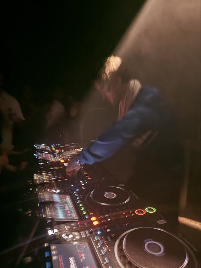 DJ Performance in Atmospheric London Club