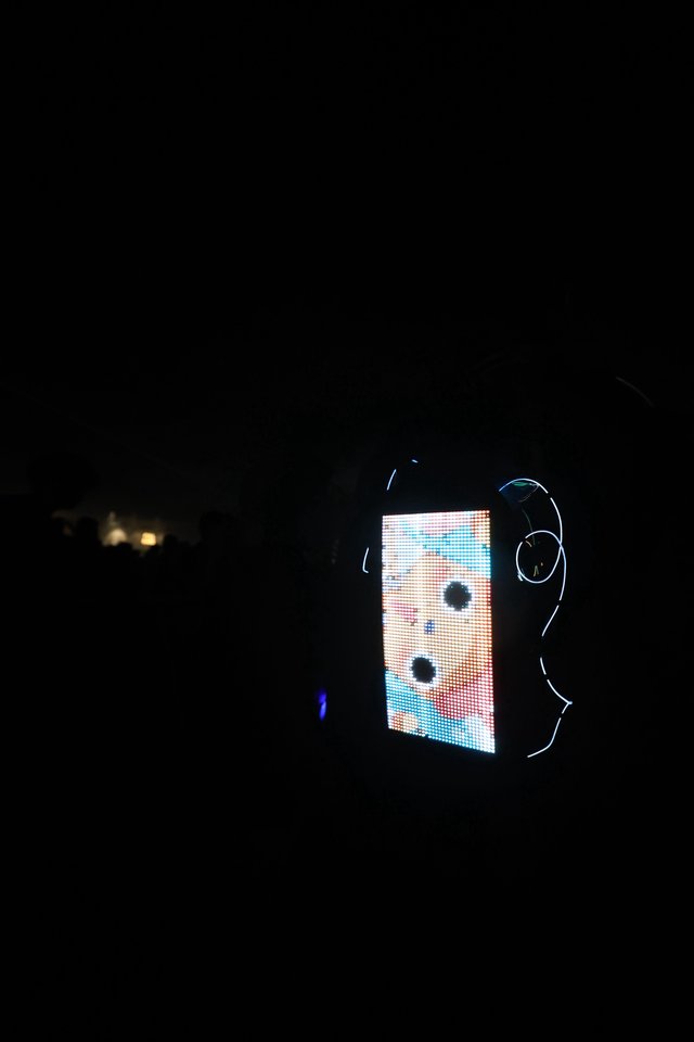 LED Face Display Glows in Dark Festival Night