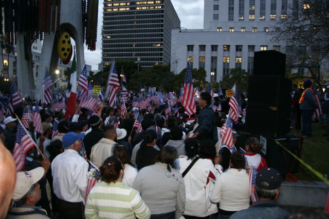 Patriotic Crowd in Front of Office Building