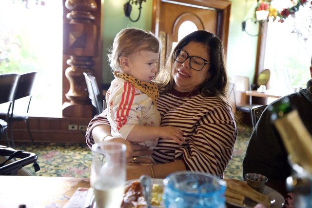 Grandmother and Grandchild Share Tender Moment at Family Gathering