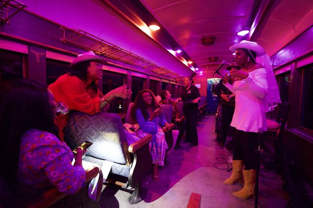 Theatrical Performance on Vintage Train Car Interior