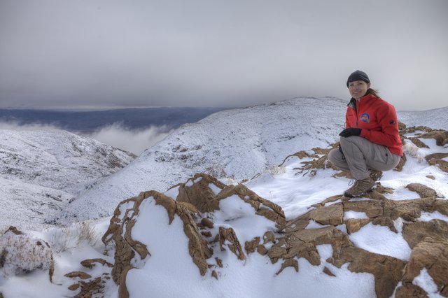 Mountain Summit Triumph Above Winter Cloud Layer