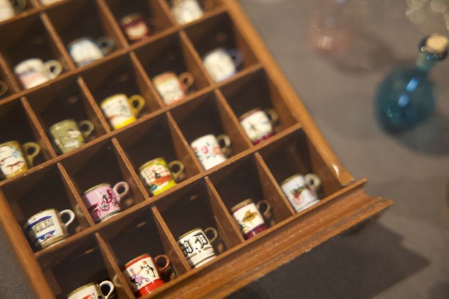 Delicate Delights: A Miniature Cup Collection