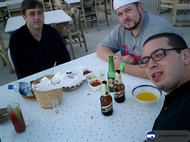 Three Men Enjoying a Beer at a Restaurant in 2003