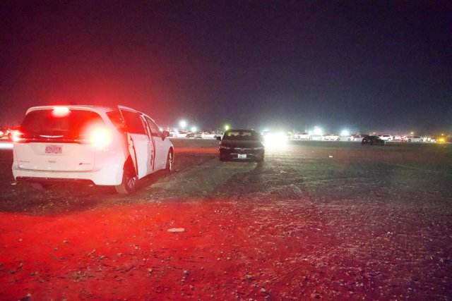 Nighttime Assembly: A Portrayal of Wheels and Excitement at Coachella 2024