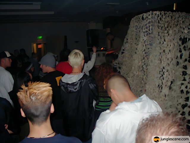 Nightclub Crowd Admiring Large Object