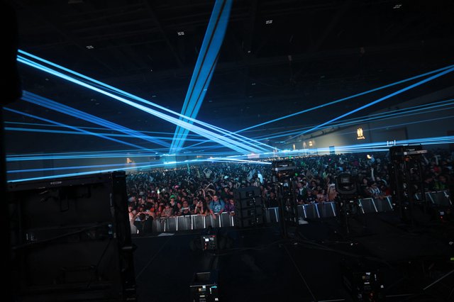 Blue Laser Storm Over Wobbleland Festival Crowd