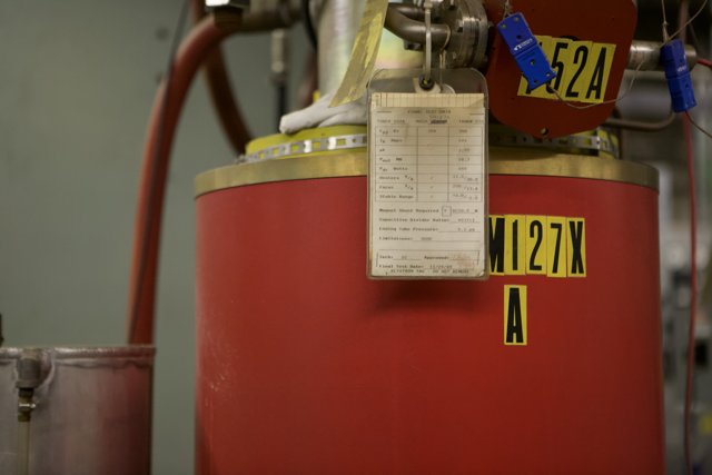 The Industrial Beauty of a Red Gas Tank