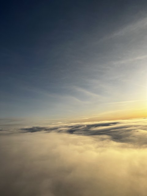 Sunset over the Clouds