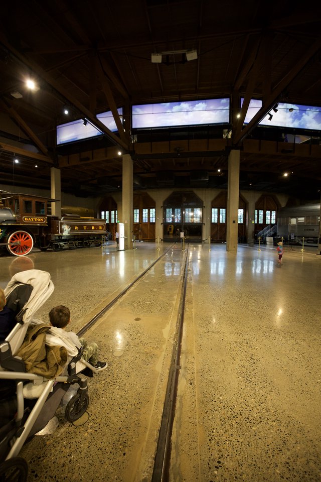 Historic Train Museum Interior with Classic Locomotives on Display
